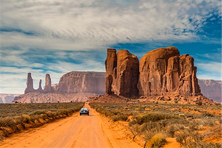 simsearch:862-08091458,k - Unpaved road with scenic desert landscape, Monument Valley Navajo Tribal Park, Arizona, USA Stock Photo - Rights-Managed, Code: 862-08091459