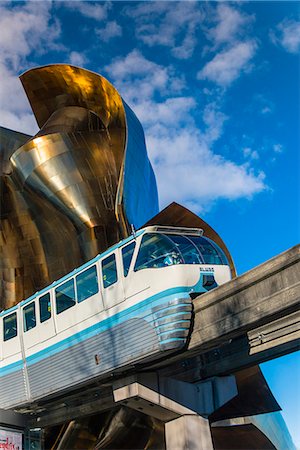 simsearch:862-07911017,k - Seattle Center Monorail passing through the Experience Music Project and Science Fiction Museum, Seattle, Washington, USA Stock Photo - Rights-Managed, Code: 862-08091475