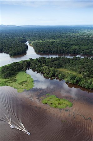 simsearch:862-08272940,k - Costa Rica, Limon province, Tortuguero National Park, aerial view of a boat on the Tortuguero river and surrounding forest Stockbilder - Lizenzpflichtiges, Bildnummer: 862-08272936