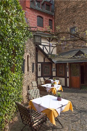 dining at germany - The Schoenburg is a castle above the medieval town of Oberwesel in the UNESCO World Heritage site of the Upper Middle Rhine Valley,Rhineland Palatinate, Germany. Stock Photo - Rights-Managed, Code: 862-08273184