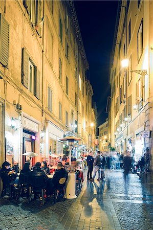simsearch:862-03888567,k - Rome, Lazio, Italy. People in the streets with bars at night. Stock Photo - Rights-Managed, Code: 862-08273333