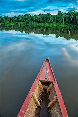 South America, Peru, Amazonia, Manu National Park, UNESCO World Heritage, dugout boat on old oxbow lake Stock Photo - Rights-Managed, Code: 862-08273777