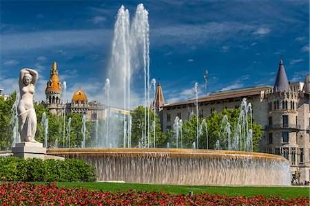 spain barcelona city - Fountain in Plaza Catalunya with Casa Rocamora modernist building behind, Barcelona, Catalonia, Spain Stock Photo - Rights-Managed, Code: 862-08273783