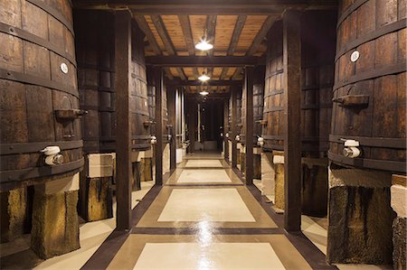 simsearch:862-03354347,k - Spain, La Rioja, Haro. Original fermentation barrels at La Rioja Alta, a traditional Rioja winery. Foto de stock - Con derechos protegidos, Código: 862-08273804