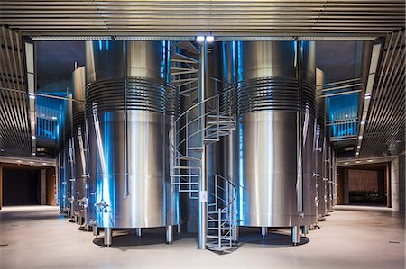 Spain, Burgos, Gumiel de Izan. Stainless steel storage tanks in Bodegas Portia, a modern Ribera Del Duero winery designed by Norman Foster. Stock Photo - Rights-Managed, Code: 862-08273800