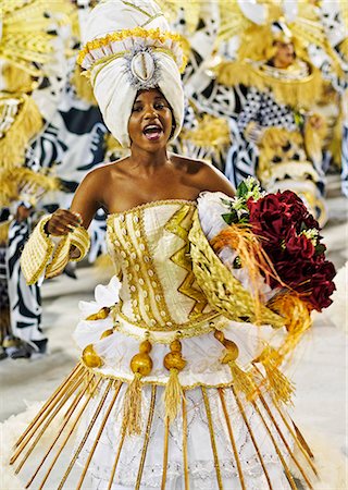 simsearch:862-06540915,k - Brazil, State of Rio de Janeiro, City of Rio de Janeiro, Samba Dancer in the Carnival Parade at The Sambadrome Marques de Sapucai. Stockbilder - Lizenzpflichtiges, Bildnummer: 862-08698747