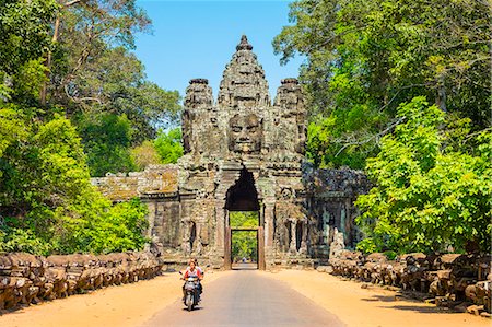 stone gates - Victory Gate entrance to Angkor Thom, UNESCO World Heritage Site, Siem Reap Province, Cambodia Stock Photo - Rights-Managed, Code: 862-08698949