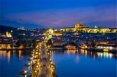 simsearch:862-08699008,k - Czech Republic, Prague. Charles Bridge and Pague Castle on the Vltava River at dusk, from Old Town Bridge Tower. Stock Photo - Rights-Managed, Code: 862-08699015