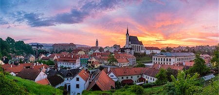 south bohemian region - Czech Republic, South Bohemian Region, Cesky Krumlov. Sunrise over Saint Vitus Church (Kostel Sv. V'ta) and buildings in old town. Stock Photo - Rights-Managed, Code: 862-08699026