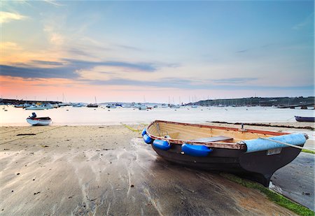 scilly - England, Isles of Scilly, St Marys. Rowing boats on Town Beach at sunset. Stock Photo - Rights-Managed, Code: 862-08699148