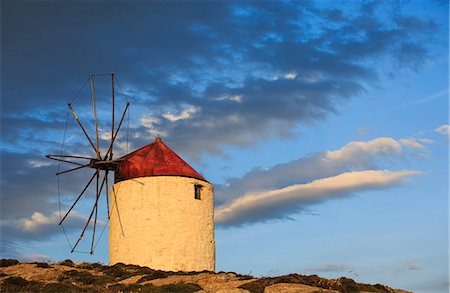 Greece, Amorgos, Chora. A windmill in Chora at sunset. Foto de stock - Con derechos protegidos, Código: 862-08699271