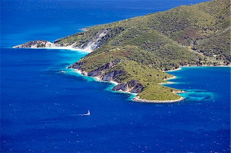 Greece, Ionian Islands, Ithaca. Sailing boat approaching the coast of Ithaca island. Photographie de stock - Rights-Managed, Code: 862-08699290