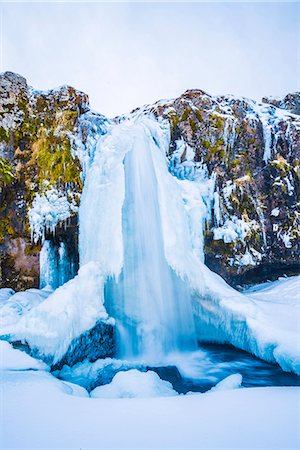 snow falls - Snaefellsness peninsula, Western Iceland, Europe. Frozen Kirkjufellfoss waterfall in winter. Stock Photo - Rights-Managed, Code: 862-08699318