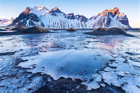 Stokksnes, Eastern Iceland, Europe. Vestrahorn mountain in a frozen winter landscape. Stock Photo - Rights-Managed, Code: 862-08699329