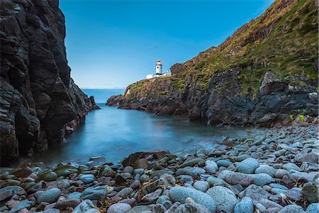 simsearch:862-08699392,k - Fanad Head (Fánaid) lighthouse, County Donegal, Ulster region, Ireland, Europe. View of the lighthouse from the down of the cove. Stock Photo - Rights-Managed, Code: 862-08699386