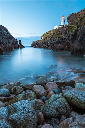 simsearch:862-08699392,k - Fanad Head (Fánaid) lighthouse, County Donegal, Ulster region, Ireland, Europe. View of the lighthouse from the down of the cove. Stock Photo - Rights-Managed, Code: 862-08699387