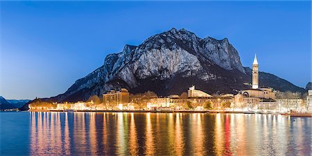 panorama and city - Lake Como, Lombardy, Italy. Lecco city at dusk with St Martin mount in the background. Stock Photo - Rights-Managed, Code: 862-08699553