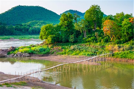 picture countryside of laos - Bamboo footbridge over Nam Khan River at confluence with Mekong River, Luang Prabang, Louangphabang Province, Laos Stock Photo - Rights-Managed, Code: 862-08699576