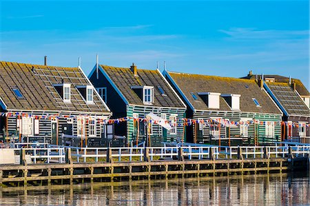 Netherlands, North Holland, Marken. Wooden buildings along the harbor in Havenbuurt. Stock Photo - Rights-Managed, Code: 862-08699678