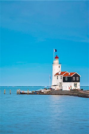 Netherlands, North Holland, Marken. Het Paard van Marken (English: Horse of Marken) lighthouse on the IJsselmeer. Stock Photo - Rights-Managed, Code: 862-08699681