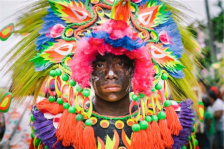 A participant of Ati-atihan festival wears a brightly colored costume, Kalibo, Aklan, Western Visayas, Philippines Foto de stock - Con derechos protegidos, Código: 862-08699700