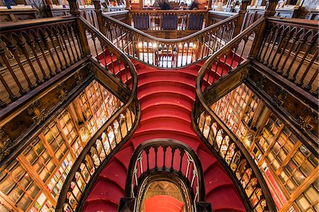 simsearch:862-08699765,k - Livraria Lello & Irmao bookstore or Lello bookstore is one of the oldest in Portugal and is rated among the top bookstores in the world, Porto, Portugal Stockbilder - Lizenzpflichtiges, Bildnummer: 862-08699789