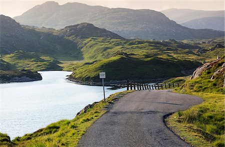 simsearch:862-08699955,k - Scotland, Western Isles, Isle of Harris. A road on Harris in evening light. Photographie de stock - Rights-Managed, Code: 862-08699996