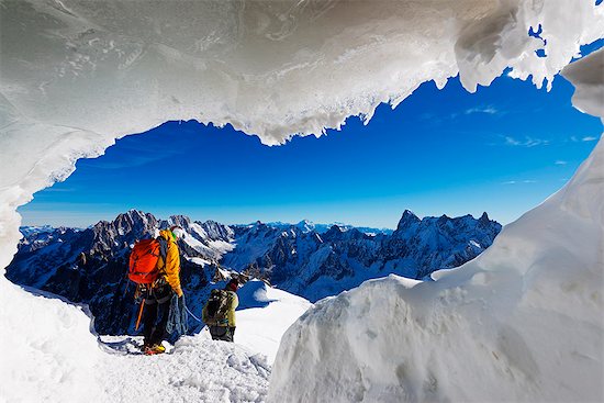 Europe, France, Haute Savoie, Rhone Alps, Chamonix, mountaineers at entrance to Aiguille du Midi arete Stock Photo - Premium Rights-Managed, Artist: AWL Images, Image code: 862-08704807