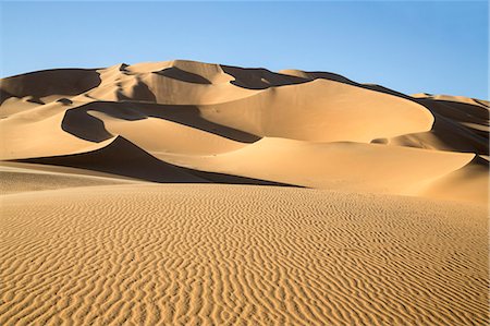 simsearch:862-08704975,k - Niger, Agadez, Sahara Desert, Tenere, Arakaou. The magnificent Arakaou sand dune in the Tenere Desert which stands about 385 m high. Foto de stock - Direito Controlado, Número: 862-08705004