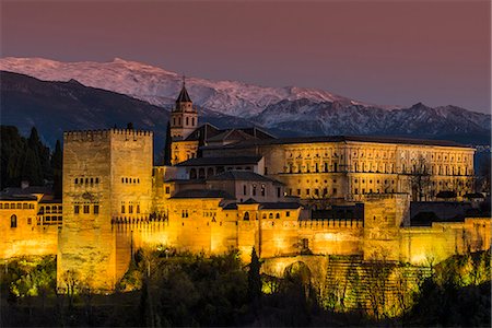View at dusk of Alhambra palace with the snowy Sierra Nevada in the background, Granada, Andalusia, Spain Stock Photo - Rights-Managed, Code: 862-08700069
