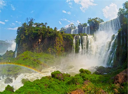 fallen (bewegung nach unten) - Argentina, Misiones, Puerto Iguazu, View of the Iguazu Falls with the rainbow. Stockbilder - Lizenzpflichtiges, Bildnummer: 862-08718409