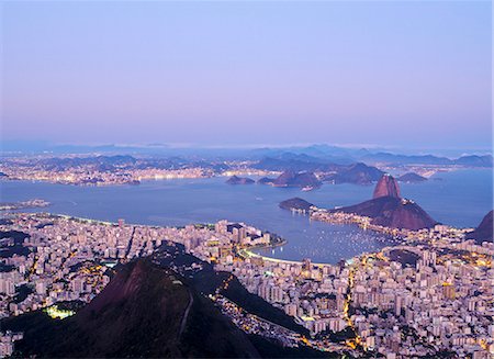 simsearch:862-08718474,k - Brazil, State of Rio de Janeiro, City of Rio de Janeiro, Corcovado Mountain, Twilight view of the city with Sugarloaf Mountain and Guanabara Bay. Stock Photo - Rights-Managed, Code: 862-08718465