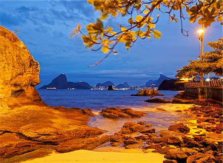 Brazil, State of Rio de Janeiro, Niteroi, Twilight view of the Beach with Skyline of Rio de Janeiro in the background. Stock Photo - Rights-Managed, Code: 862-08718462