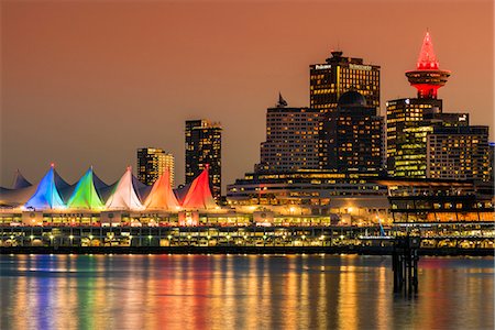 View at sunset of Canada Place and Harbour Centre building decorated with Christmas lights, Vancouver, British Columbia, Canada Stock Photo - Rights-Managed, Code: 862-08718514