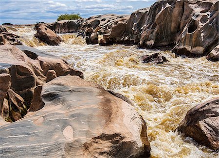 simsearch:862-08718761,k - Kenya, Taita-Taveta County, Tsavo East National Park. The Galana River at Lugard Falls. Foto de stock - Direito Controlado, Número: 862-08719197