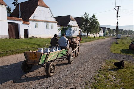 simsearch:862-03360982,k - Romania, Transylvania, Viscri. Bringing milk to be measured at the village co-operative. Stock Photo - Rights-Managed, Code: 862-08719404