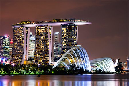 singaporean (places and things) - South East Asia, Singapore, Gardens by the Bay Cloud Forest and Flower Dome, Marina Bay Sands Hotel and Casino Stock Photo - Rights-Managed, Code: 862-08719494