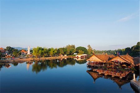simsearch:862-08719678,k - South East Asia, Thailand, Kanchanaburi, floating raft restaurant on the River Kwai, and Kuang Im Chapel buddhist temple Stock Photo - Rights-Managed, Code: 862-08719671