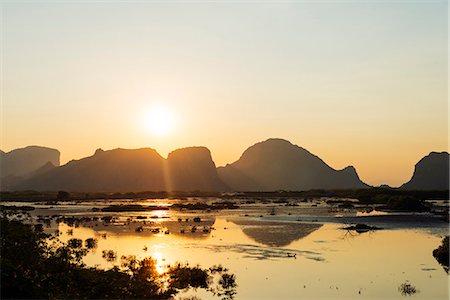 simsearch:862-08699572,k - South East Asia, Thailand, Prachuap Kiri Khan, Khao Sam Roi Yot National Park sunset Foto de stock - Con derechos protegidos, Código: 862-08719733