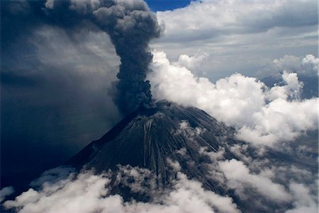 Smoke billows from Ol Donyo Lengai, Tanzania, Africa Photographie de stock - Rights-Managed, Code: 862-08719899