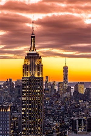 Top view at sunset of the Empire State Building with One World Trade Center in the background, Manhattan, New York, USA Stock Photo - Rights-Managed, Code: 862-08720039