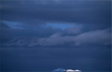 simsearch:862-03288559,k - Icebergs and mountains on eve of storm. Antarctic Peninsula. Stock Photo - Rights-Managed, Code: 862-03288589