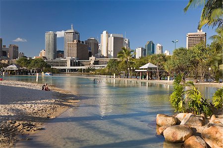 swimming holes - Streets Beach - an artificial lagoon in the South Bank Parklands - is a popular swimming spot for Brisbane families. Stock Photo - Rights-Managed, Code: 862-03288640