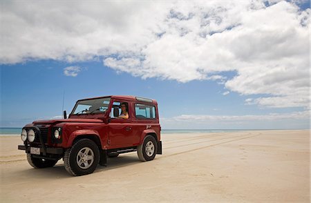 Four wheel driving on the beaches of Fraser Island. The world's largest sand island has no paved roads and can only be traversed by 4WD. Stock Photo - Rights-Managed, Code: 862-03288735