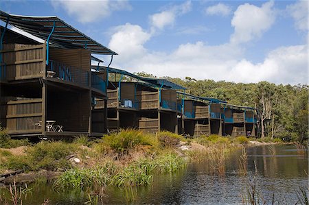east - Luxury villas sit in a bush setting at the Kingfisher Bay Resort,the largest ecoresort on the World Heritage Listed Fraser Island. Stock Photo - Rights-Managed, Code: 862-03288749