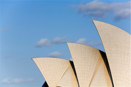 simsearch:862-03736184,k - The iconic arches of the Sydney Opera House. Inspired by palm fronds and covered by over a million Swedish made tiles the Opera House is one of the world's most recognised landmarks. Stock Photo - Rights-Managed, Code: 862-03288820
