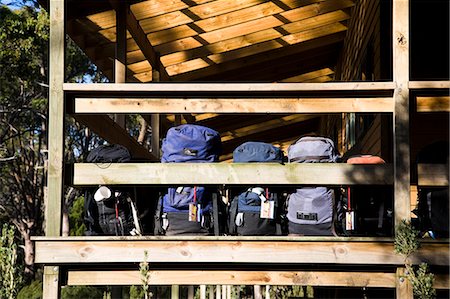 simsearch:862-03289027,k - Backpacks lined up on the balcony of New Pelion Hut on the Overland Track Foto de stock - Con derechos protegidos, Código: 862-03289018