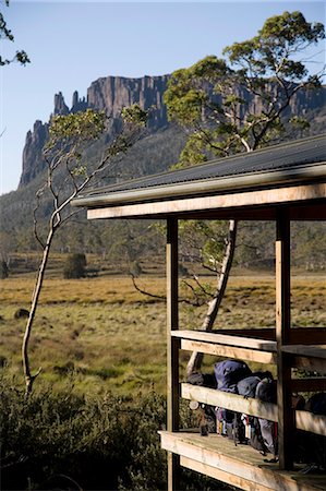 simsearch:862-03289022,k - Backpacks lined up on the balcony of New Pelion Hut on the Overland Track Foto de stock - Con derechos protegidos, Código: 862-03289019