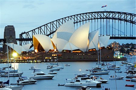 porto di sydney - Australia,New South Wales,Sydney,Sydney Harbour. Opera House and Coathanger Bridge with many yachts in the water. Fotografie stock - Rights-Managed, Codice: 862-03289090