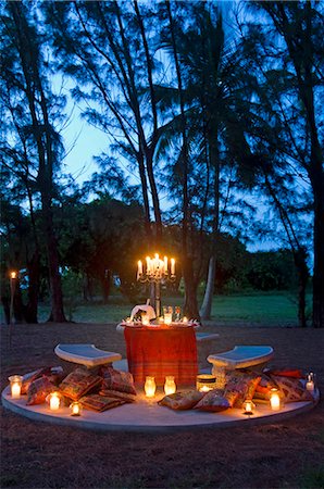 Champagne and canapes served at the table in the Casuarina grove on Little Whale Cay Stock Photo - Rights-Managed, Code: 862-03289328